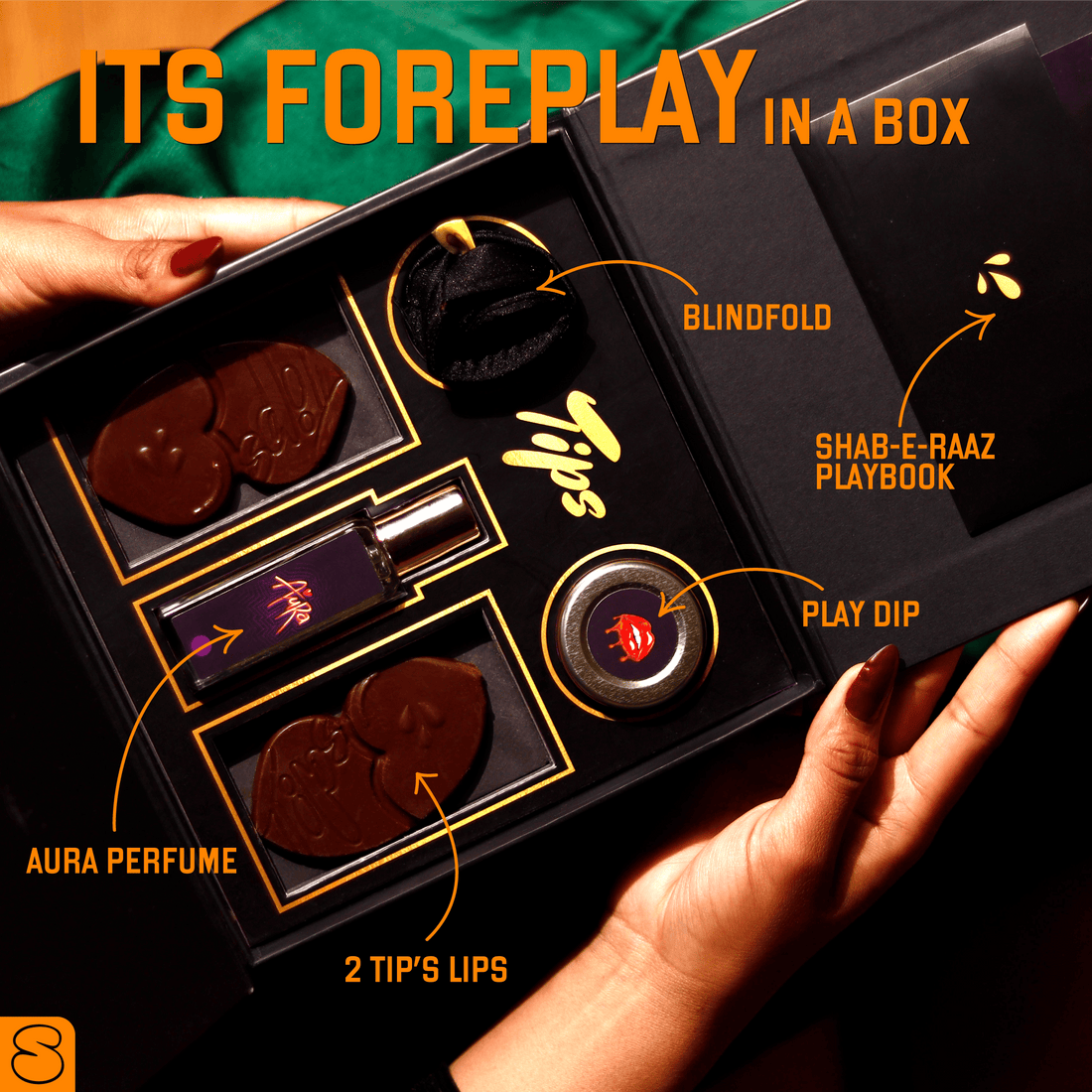 Top view of the Tips Foreplay Box India showing chocolates, perfume, dip, blindfold, and playbook with labeled compartments