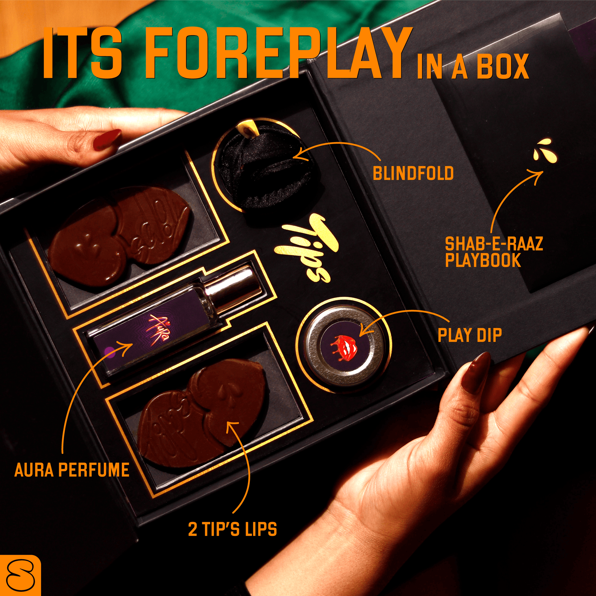 Top view of the Tips Foreplay Box India showing chocolates, perfume, dip, blindfold, and playbook with labeled compartments