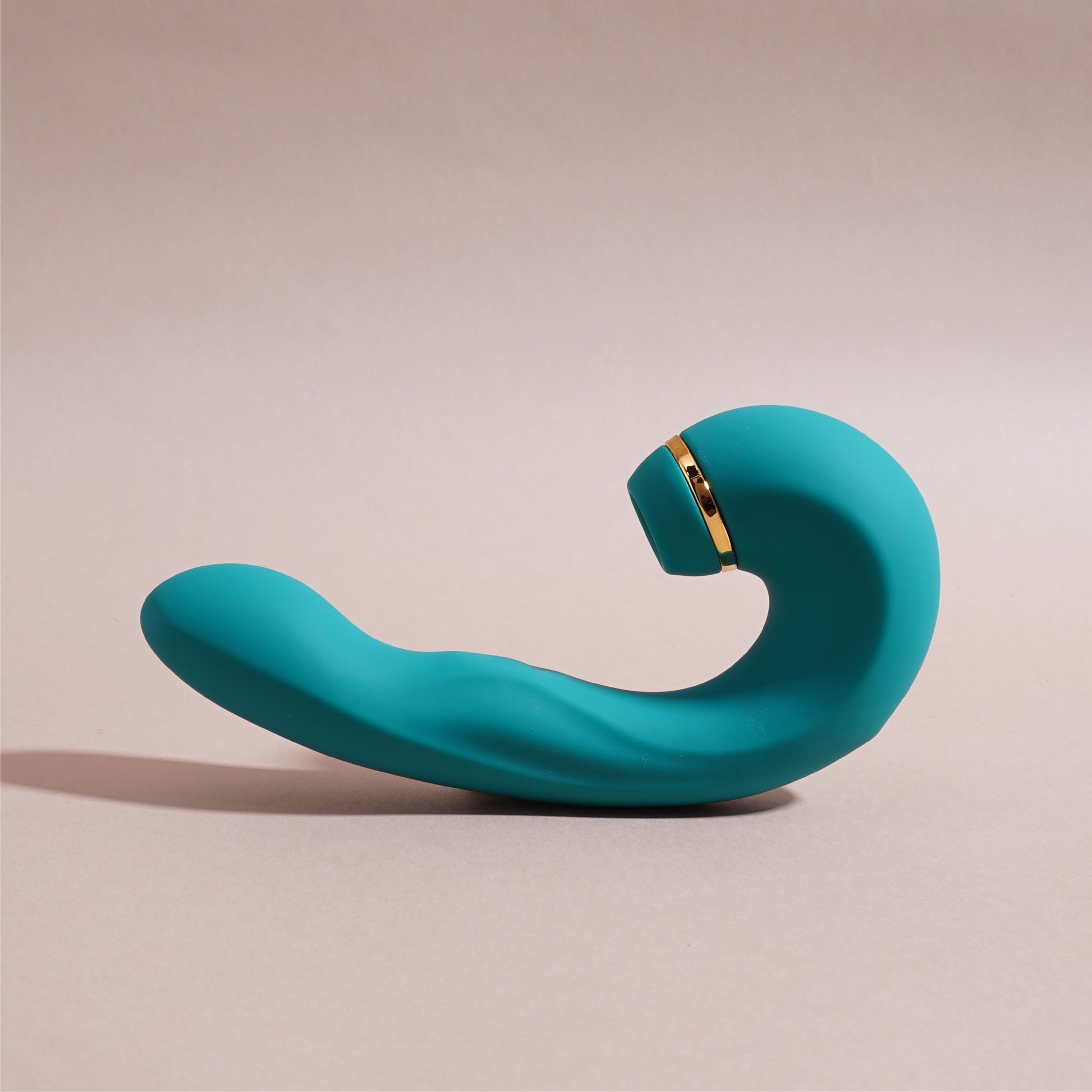 Buy Couple Massager Combo India β Shiver massager with elegant curve and premium gold detailing on pastel backdrop