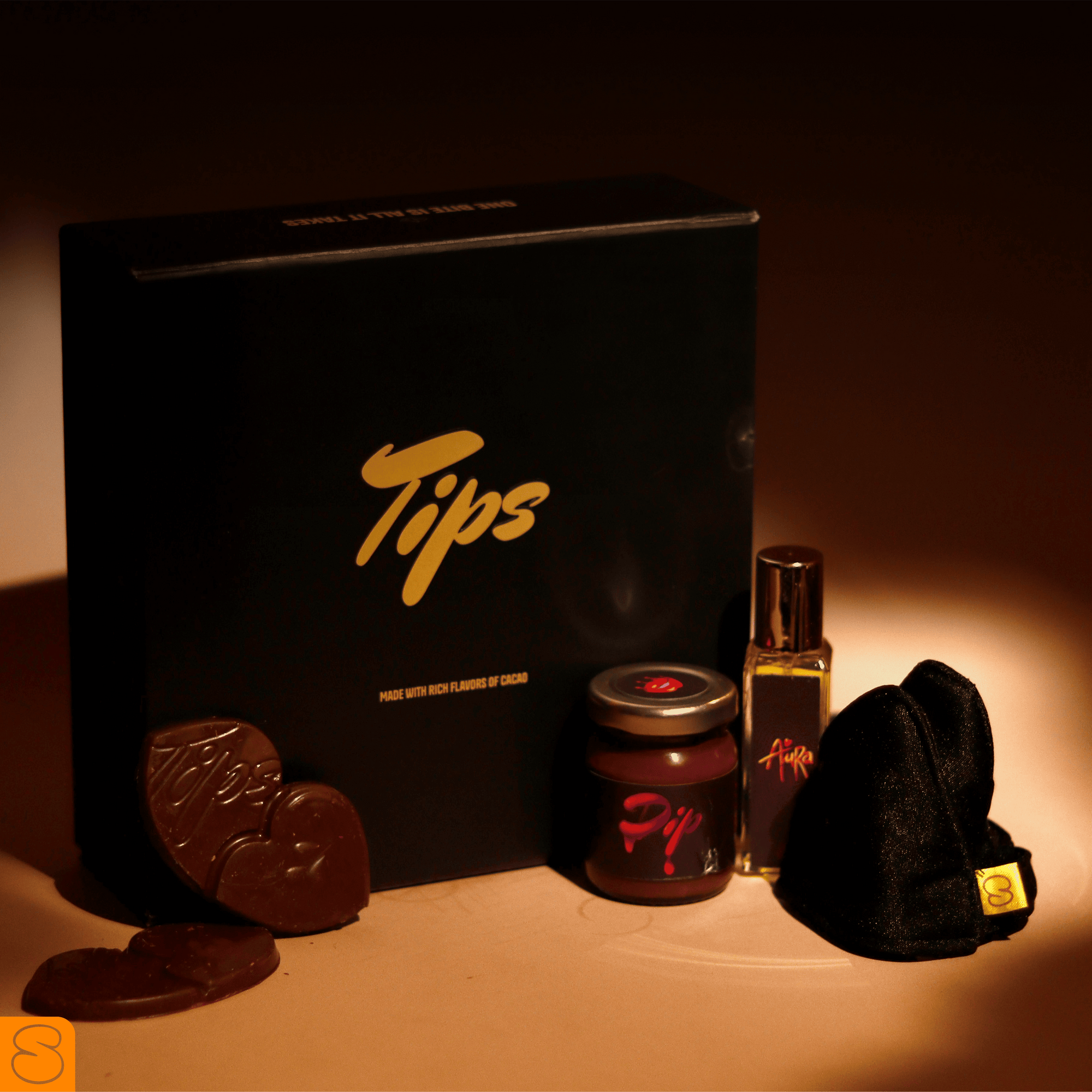 Buy Tips Foreplay Box India – featuring chocolates, play dip, AURA perfume, and blindfold for a sensual experience