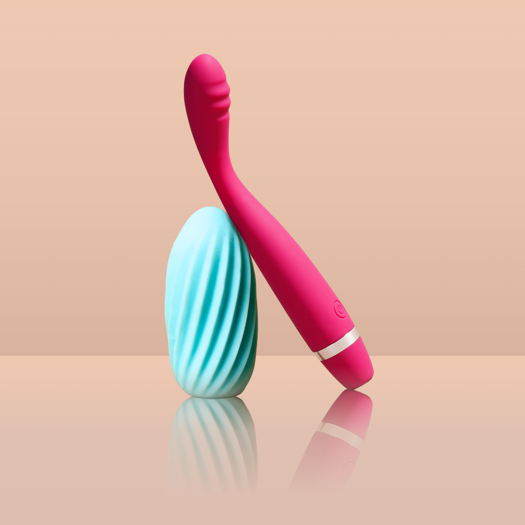 Double Trouble Combo India featuring pink Crave massager and blue Fap stroker on pastel background

