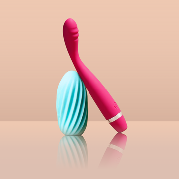 Double Trouble Combo India featuring pink Crave massager and blue Fap stroker on pastel background

